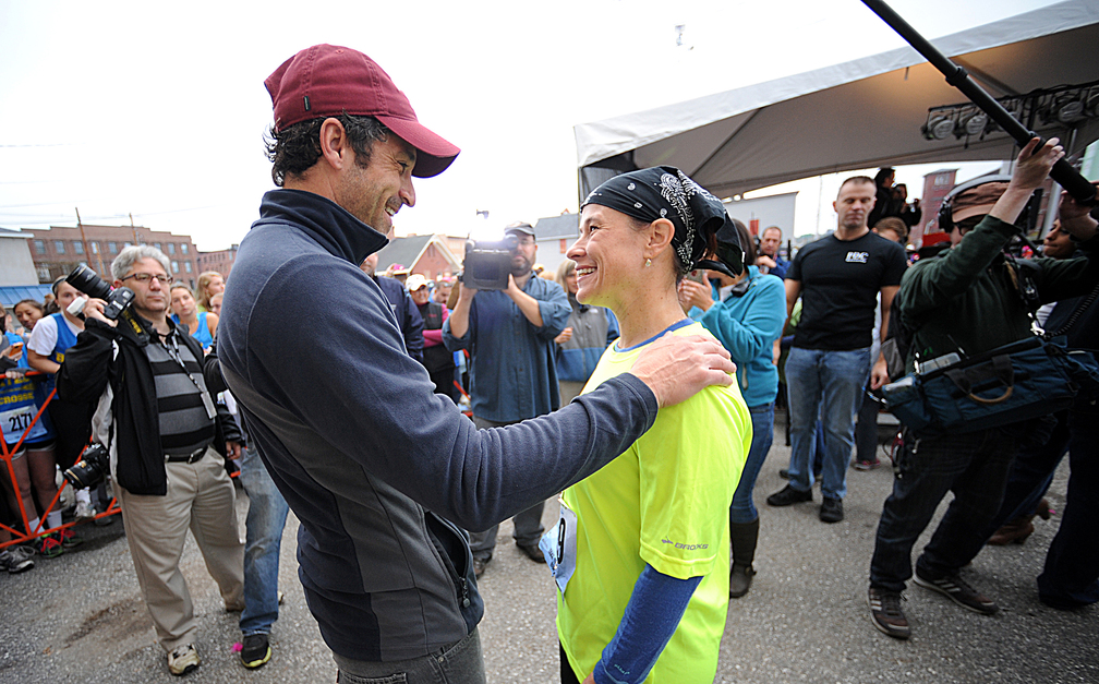 Patrick Dempsey greets Jeni Schumacher of Greenville, S.C., before the start of the fifth annual Dempsey Challenge on Saturday in Lewiston. Schumacher, a nine -times melanoma cancer survivor, cycled from Greenville with 16 other cyclists on the team Challenge to Conquer Cancer. The group relayed over 1,300 miles and 5,550 feet of climbing on their route.