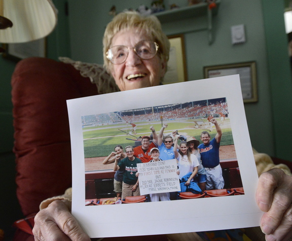 Marge Lee of South Berwick is an avid Red Sox fan and attended her first game last summer. The photo, taken after the game, shows Marge surrounded by members of her family and holding a sign she made addressing NESN announcers Jerry Remy and Don Orsillo.