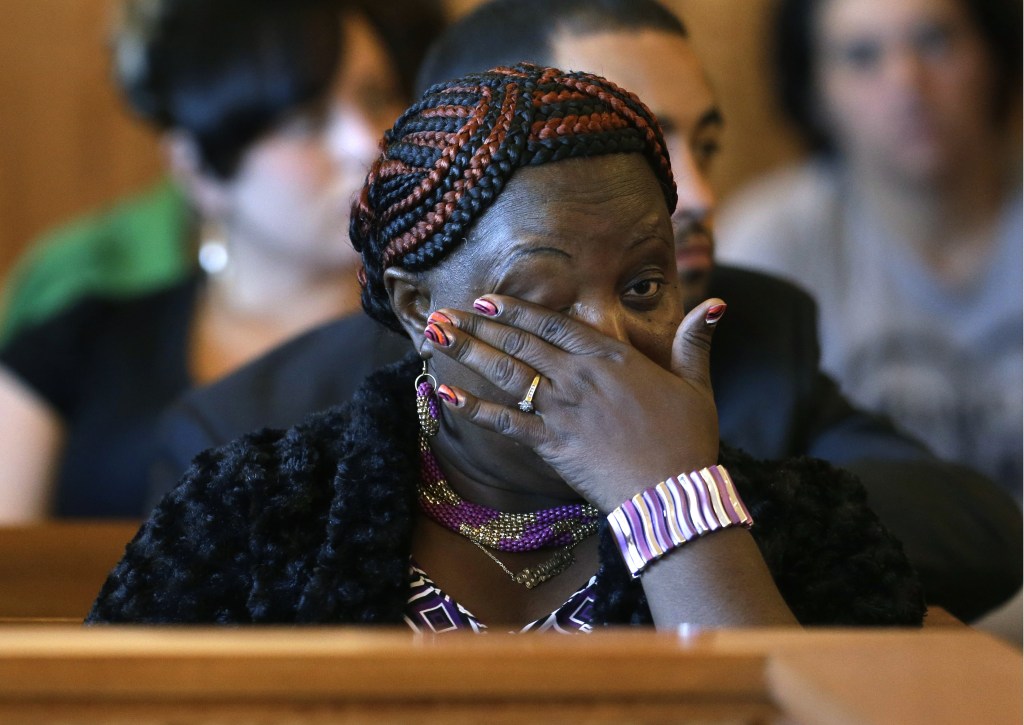 Ursula Ward, mother of murder victim Odin Lloyd, wipes away a tear during the arraignment of Shayanna Jenkins in superior court, in Fall River, Mass., Tuesday, Oct. 15, 2013. Jenkins, girlfriend of former New England Patriots’ Aaron Hernandez, was arraigned on a perjury charge in connection with the killing of Lloyd. Authorities say she was untruthful in her testimony before the grand jury investigating his death.