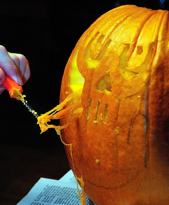 Halloween Art: Corey Boynton carves a pumpkin during the After School Art Program Wednesday at Johnson Hall in Gardiner.