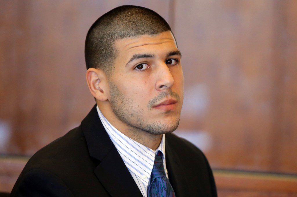 Former New England Patriots NFL football player Aaron Hernandez attends a pretrial court hearing in Fall River, Mass. on Wednesday, Oct. 9, 2013. Hernandez was indicted in August in the killing of 27-year-old Odin Lloyd, a semi-professional football player from Boston who was dating the sister of Hernandez's girlfriend. He has pleaded not guilty. (AP Photo/Brian Snyder, Pool)