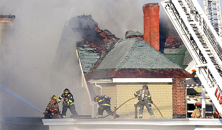 Firefighters battle a blaze that heavily damaged three apartment buildings in downtown Lewiston on April 29 . The confession of the boy charged with starting the fire has been thrown out by a judge.