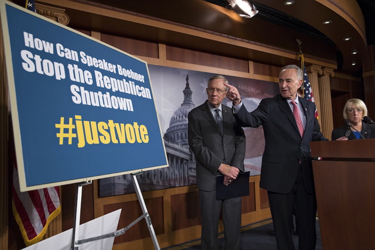 From left Senate Majority Leader Harry Reid, D-Nev., Sen. Chuck Schumer, D-N.Y., and Sen. Patty Murray, D-Wash., chair of the Senate Budget Committee, tell reporters that Speaker of the House John Boehner, R-Ohio, and House Republicans are the obstacle to ending the government shutdown crisis, at the Capitol in Washington, Thursday, Oct. 3, 2013. President Barack Obama brought congressional leaders to the White House on Wednesday for the first time since a partial government shutdown began, but there was no sign of progress toward ending an impasse that has idled 800,000 federal workers and curbed services around the country.