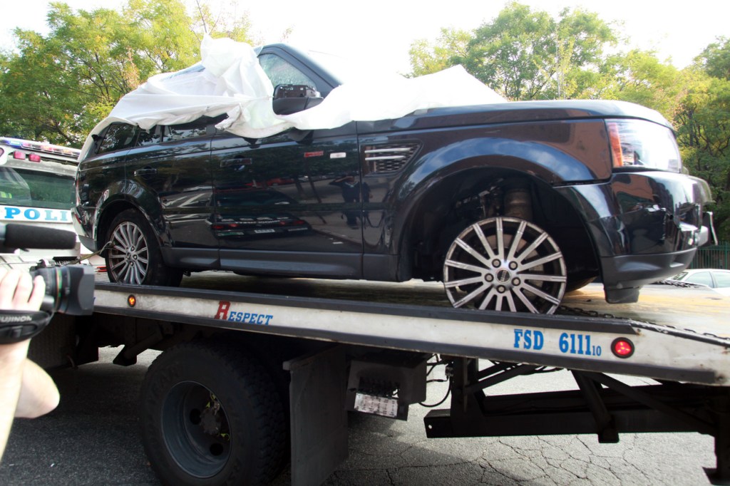 The Range Rover involved in the bikers attack is being moved from the police precinct for further police investigation on Oct. 5, 2013, in New York.