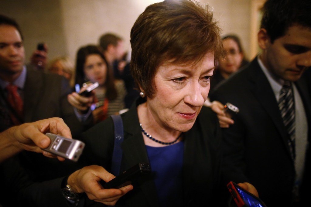 Sen. Susan Collins, R-Maine, is followed by reporters as she leaves a meeting of Senate Republicans regarding the government shutdown and debt ceiling on Capitol Hill in Washington on Saturday.