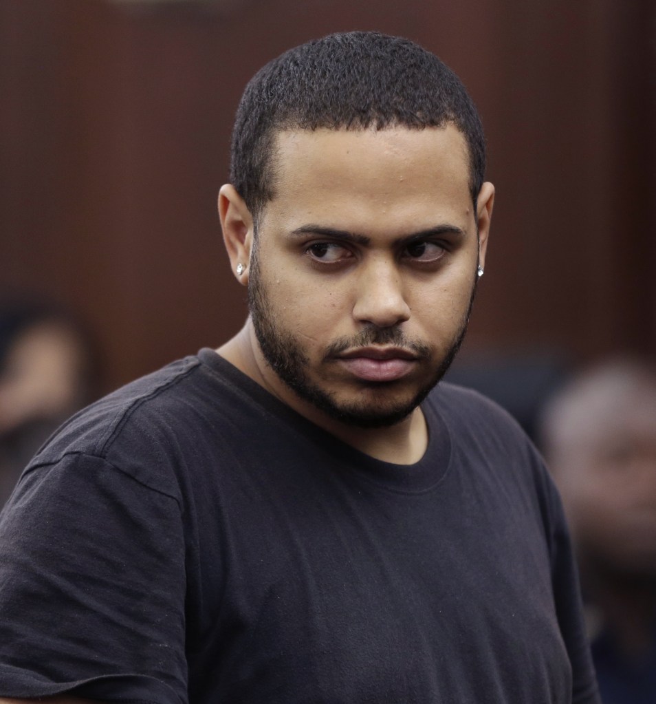 Christopher Cruz appears in criminal court in New York Wednesday. Cruz, 28, of New Jersey, was charged with reckless driving after prosecutors said he touched off a tense encounter with the driver of a sport utility vehicle and a throng of other bikers that ended with blood and broken bones on a Manhattan street.