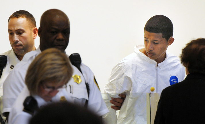 Philip Chism, 14, stands during his arraignment for the death of Danvers High School teacher Colleen Ritzer in Salem District Court in Salem, Mass., on Wednesday. Chism has been ordered held without bail.