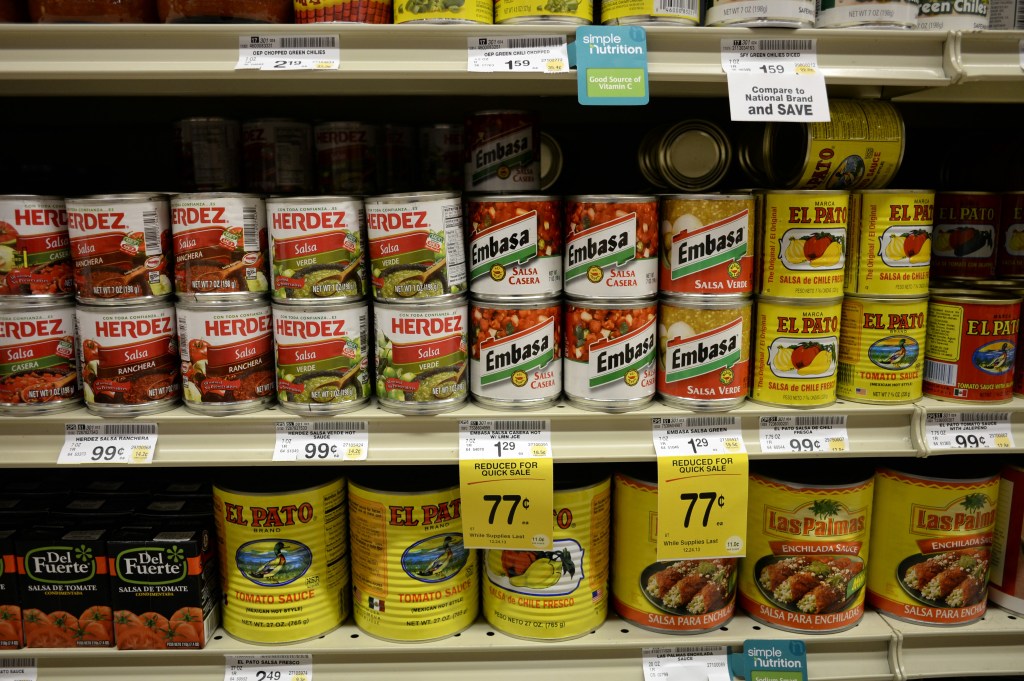 Salsas and other items are seen in the international food aisle of a grocery store Wednesday in Washington.