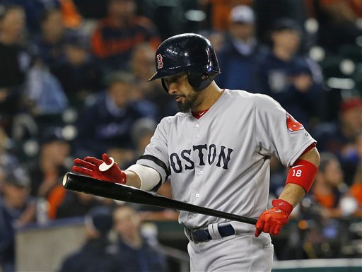 Boston Red Sox's Shane Victorino reacts after striking out in the ninth inning during Game 4 of the American League baseball championship series against the Detroit Tigers, Wednesday, Oct. 16, 2013, in Detroit. (AP Photo/Paul Sancya)