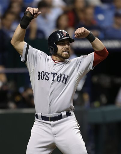 HUGE RUN: Boston’s Jacoby Ellsbury celebrates after scoring the go-ahead run on Shane Victorino’s infield single inthe seventh inning of the Red Sox’ 3-1 win over Tampa Bay in Game 4 of the American League Division Series on Tuesday in St. Petersburgh, Fla. AP photo Tropicana Field