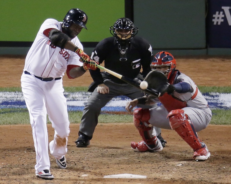 Boston Red Sox's David Ortiz hits a two-run home run during the sixth inning of Game 2 of baseball's World Series against the St. Louis Cardinals Thursday, Oct. 24, 2013, in Boston. MLB