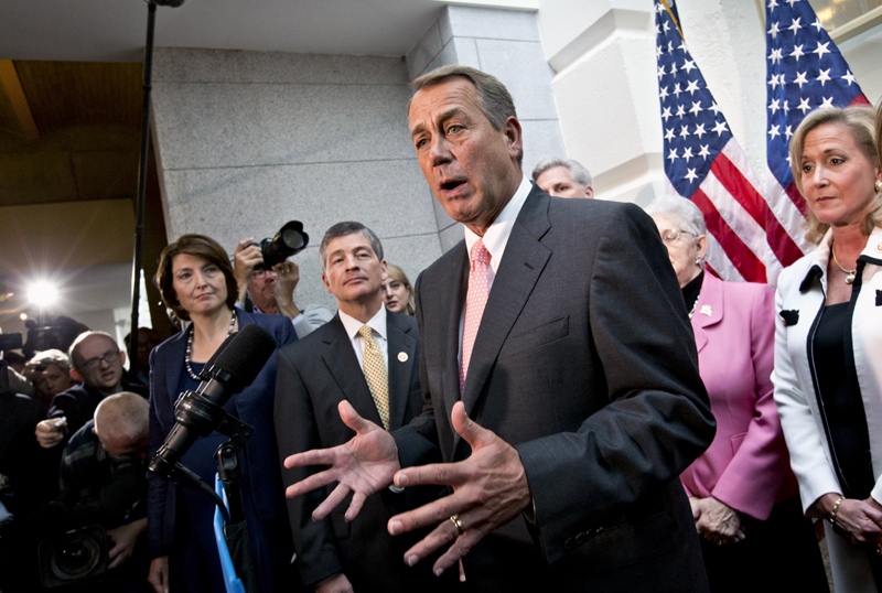 House Speaker John Boehner, joined by fellow Republicans, speaks during a news conference on Capitol Hill in Washington on Thursday, following a closed-door GOP meeting, to announce that House Republicans will advance legislation to temporarily extend the government's ability to borrow money to meet its financial obligations. From left are Rep. Cathy McMorris Rodgers, R-Wash., Rep. Jeb Hensarling, R-Texas, Boehner, Majority Whip Kevin McCarthy of Calif., Rep. Virginia Foxx, R-N.C., and Rep. Ann Wagner, R-Mo.