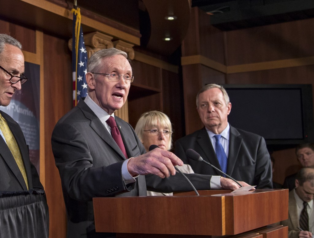 From left, Sen. Chuck Schumer, D-N.Y., Senate Majority Leader Harry Reid, D-Nev., Sen. Patty Murray, D-Wash., chair of the Senate Budget Committee, and Senate Majority Whip Dick Durbin, D-Ill., speak to reporters after the Democratic-led Senate rejected conditions that House Republicans attached to a temporary spending bill, at the Capitol in Washington on Monday.