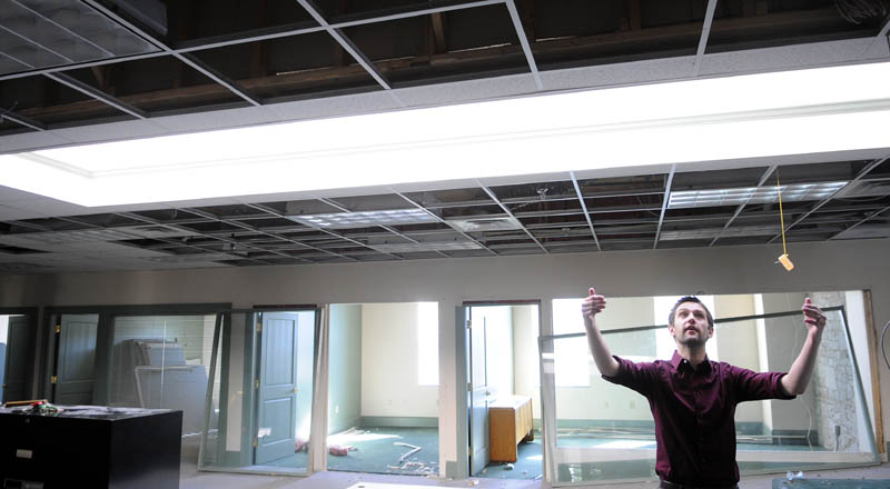 William Guerrette III is overseeing a project to renovate his family's building at 227 Water St. in Augusta to build nine apartment units. He gave a tour of the third floor Thursday, where most apartments will be located and features a skylight.