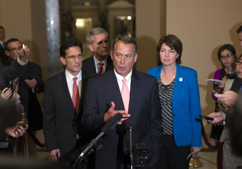 Speaker of the House John Boehner, R-Ohio, center, with House GOP leaders, speaks briefly to reporters, just after 1 a.m., Tuesday morning. Joining Boehner, from left, are House Majority Leader Eric Cantor, R-Va., House Majority Whip Kevin McCarthy, R-Calif., and Rep. Cathy McMorris Rodgers, R-Wash., the Republican Conference chair.