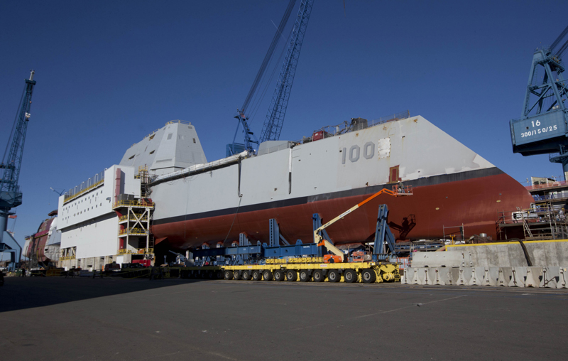 The first-in-class Zumwalt, the largest U.S. Navy destroyer ever built, is seen at Bath Iron Works in Bath, Maine. The christening of the Zumwalt was canceled once because of the government shutdown. But plans call for the ship to be moved to dry dock in Maine and floated without fanfare in the coming days.