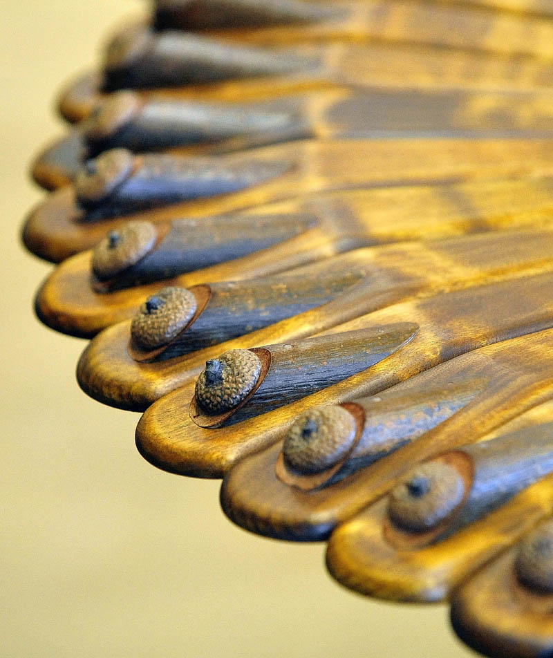 This table by Randy Holden, of Norridgewock, highlights acorn shells as decoration.