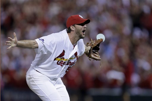 St. Louis Cardinals pitcher Adam Wainwright celebrates after striking out Pittsburgh Pirates' Pedro Alvarez for the final out of Game 5 of a National League baseball division series, Wednesday, Oct. 9, 2013, in St. Louis. The Cardinals won 6-1, and advanced to the NL championship series against the Los Angeles Dodgers. (AP Photo/Charlie Riedel)