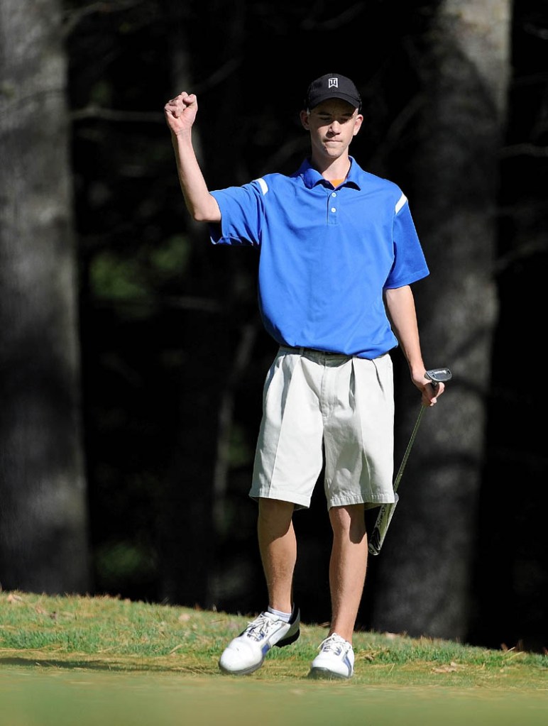 Madison High School’s Ty Cowan pumps his fist after sinking a birdie putt on the 16th hole Wednesday during the Mountain Valley Conference qualifier at Natanis Golf Course in Vassalboro. Cowan qualified for the individual tournament with an 83.
