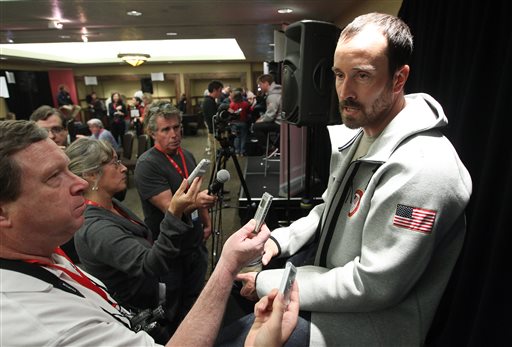 Seth Wescott, the two-time defending gold medalist in snowboardcross, speaks with reporters during a news conference at the U.S. Olympic Committee media summit Wednesday, Oct. 2, 2013, in Park City, Utah. (AP Photo/Rick Bowmer)