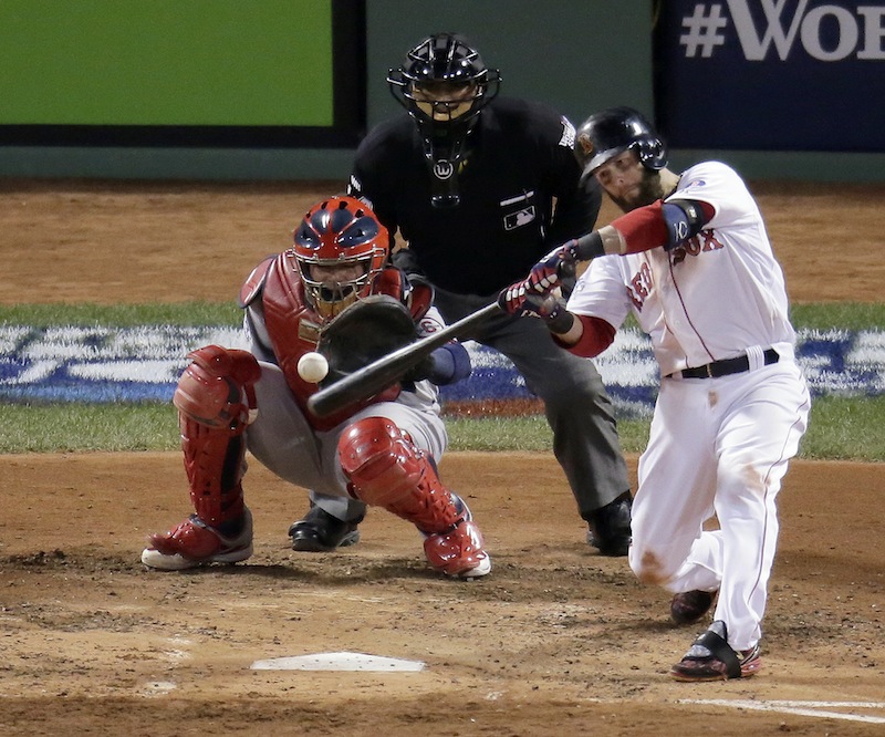 Boston Red Sox's Dustin Pedroia hits a double during the fourth inning of Game 2 of baseball's World Series against the St. Louis Cardinals Thursday, Oct. 24, 2013, in Boston. MLB