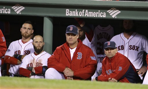 Boston Red Sox manager John Farrell and players watch during the ninth inning of Game 2 of baseball's World Series against the St. Louis Cardinals Thursday in Boston. The Cardinals won 4-2 to even the series 1-1. MLB