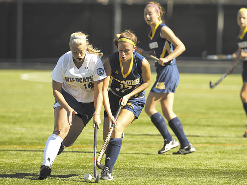 USING HER SPEED: Waterville graduate Jenna Gagnon, right, has 13 points for Simmons College this season. Gagnon has four goals and five assists.