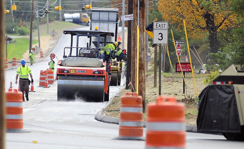 Paving work continues on Route 3, Old Belgrade Road, between Route 27 and Bog Road on Thursday in Augusta.