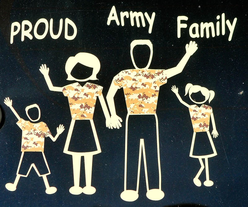 The silhouettes on the back of the Lewis' family vehicle wear camouflage.
