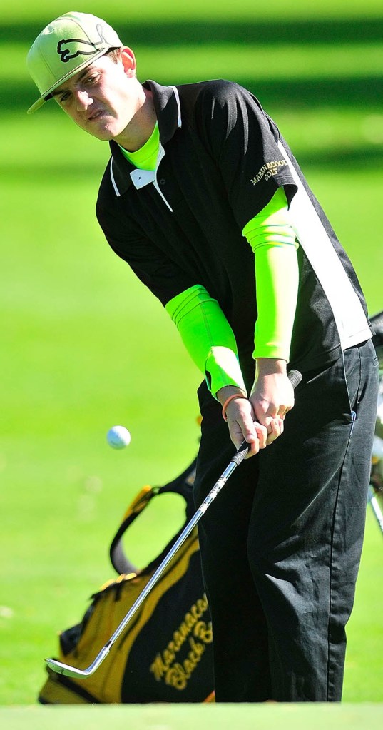 A GOOD DAY: Maranacook’s Luke Ruffing hits onto the ninth green during the Kennebec Valley Athletic Conference qualifying tournament Tuesday at Natanis Golf Course in Vassalboro. Ruffing was the top individual qualifier in Class B, shooting 68. Maranacook also qualified for the state team tournament.