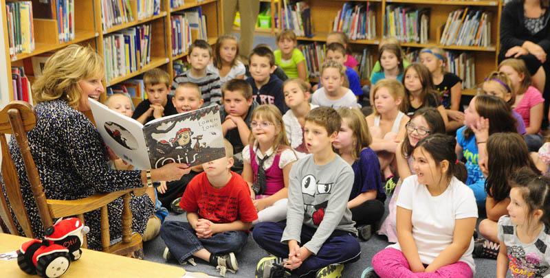 First Lady Ann LePage reads "Otis," by Loren Long, to schoolchildren Thursday at Gilbert Elementary School in Augusta, as part of Jumpstart's Read for the Record initiative. Together with Jumpstart and the Pearson Foundation, Mrs. LePage will join children and adults across the country in attempting to set a new world record for the largest shared reading experience. The event is part of a nationwide, early education awareness campaign that each fall focuses national attention on the importance of reading.