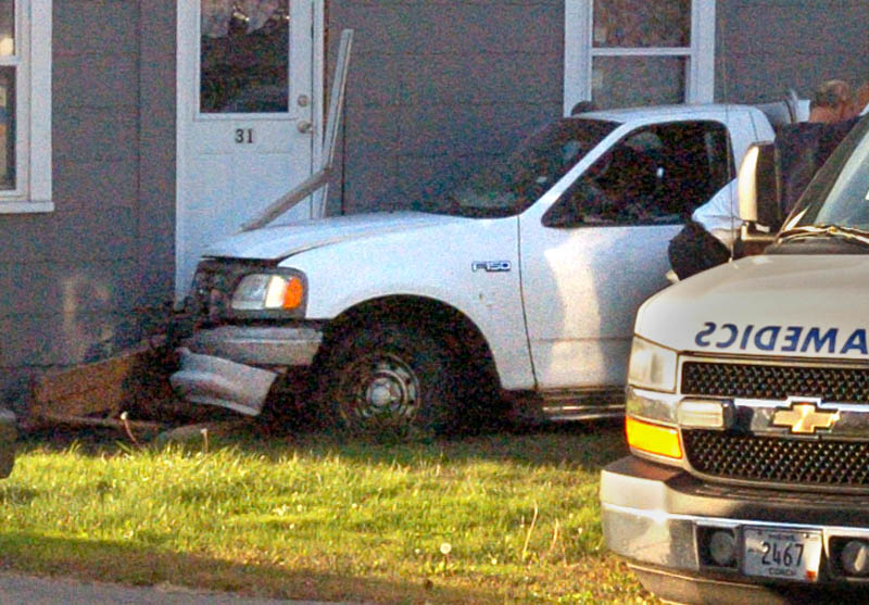 One man was taken to the hospital after the car he was driving veered off Bay Street and into a house in Winslow Friday.