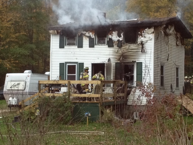The site of a fire at 119 Granite Hill Road in Manchester Saturday morning.