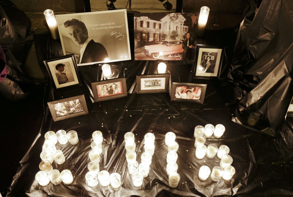 A memorial to Elvis Presley is on display outside Graceland on Aug. 15, 2012, to commemorate the 35th anniversary of Presley’s death. 