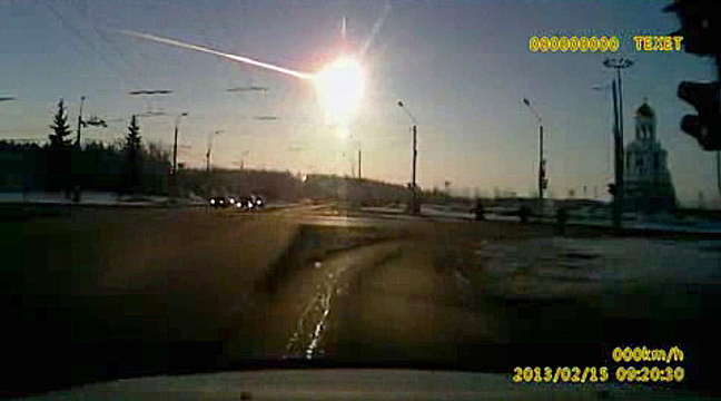 In this screen image made from a dashboard camera video shows a meteor streaking through the sky over Chelyabinsk, about 930 miles east of Moscow on Feb. 15, 2013. The meteor hit Earth at 42,000 mph and exploded over the Russian city, smashing windows and causing minor injuries.