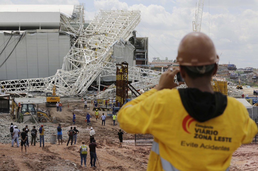 A metal structure sits atop the Itaquerao Stadium after a collapse in Sao Paulo, Brazil, on Wednesday.