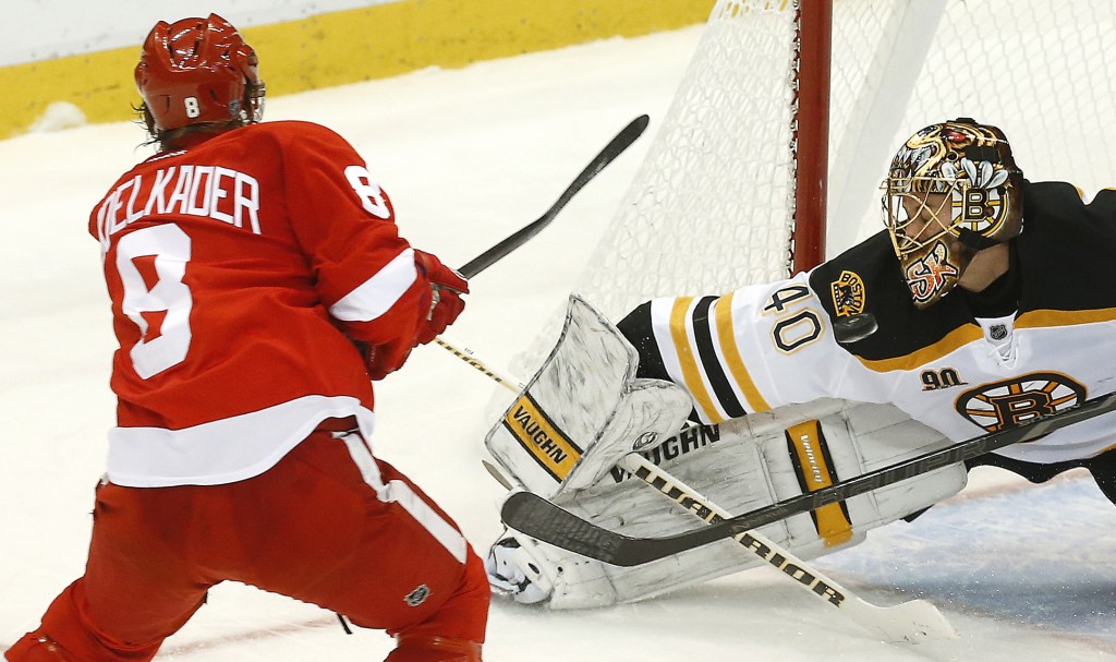 SAVE: Boston Bruins goalie Tuukka Rask (40) stops a Detroit Red Wings left wing Justin Abdelkader (8) shot in the third period of a game Wednesday in Detroit. Detroit won 6-1.