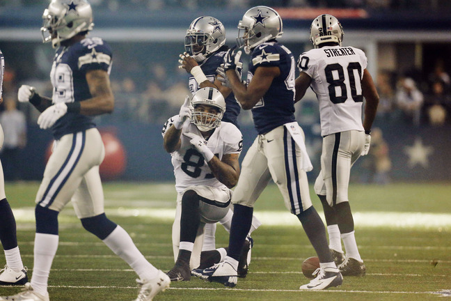 Oakland Raiders tight end Mychal Rivera (81) celebrates after a run against the Dallas Cowboys during the first half of an NFL football game, Thursday, Nov. 28, 2013, in Arlington, Texas. (AP Photo/Brandon Wade)