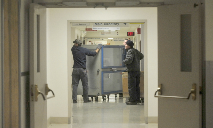 MOVING: Workers move equipment as a $16 million renovation project begins at Thayer Center for Health in Waterville.