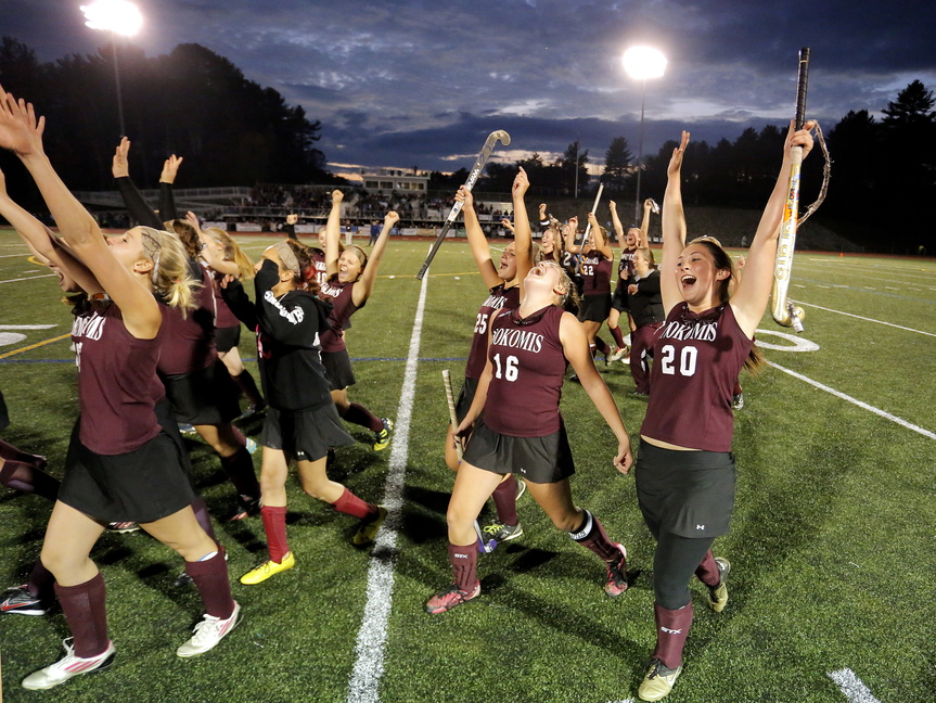 WINNERS: Nokomis celebrates its victory over York in the Class B field hockey championship game Saturday at Yarmouth High School.