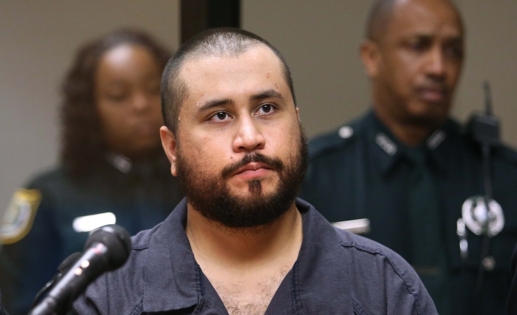George Zimmerman listens in court on Nov. 19, 2013, in Sanford, Fla., during his hearing on charges including aggravated assault stemming from a fight with his girlfriend.