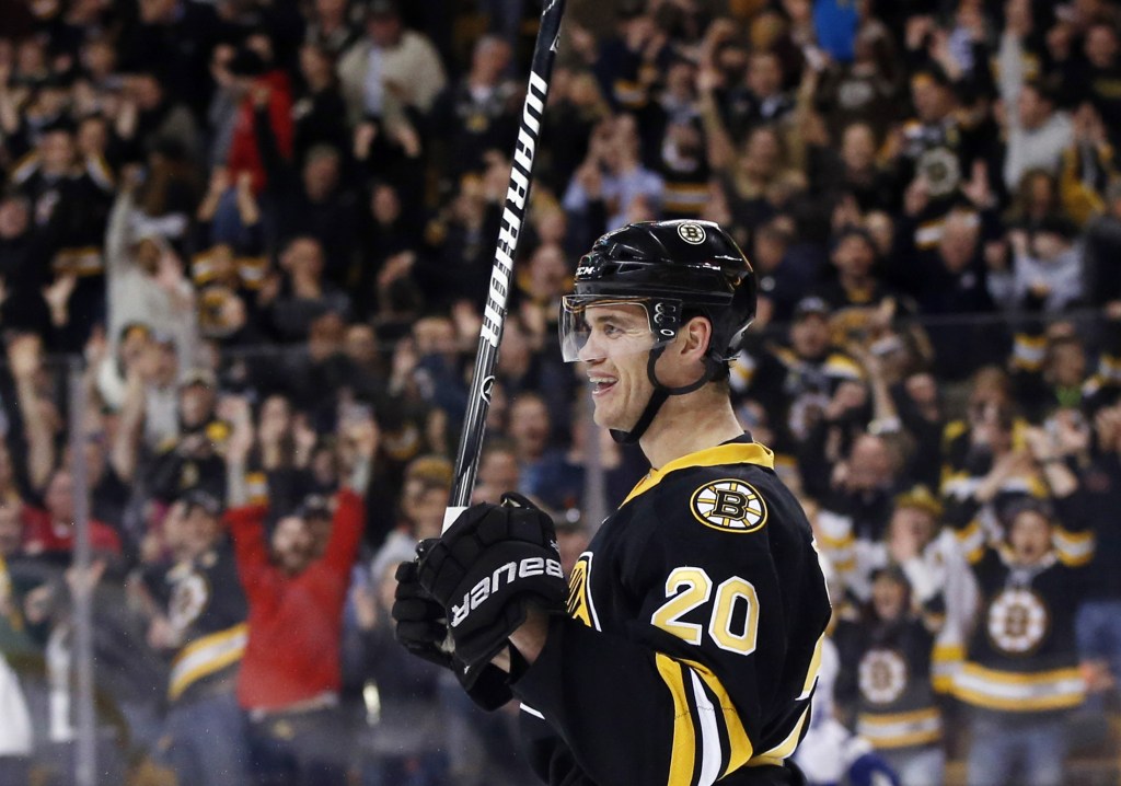 THAT’S A GOAL: Boston left wing Daniel Paille (20) celebrates after scoring a goal during the second period of the Bruins’ 3-0 win over Tampa Bay on Monday in Boston.