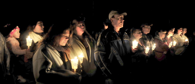 TRIBUTE: Close to 150 family and friends attended a candlelight vigil for Jillian Jones in Bingham where she grew up on Sunday. Jones was killed last week in Augusta. People remembered Jones, comforted each other and listened to music that she liked.