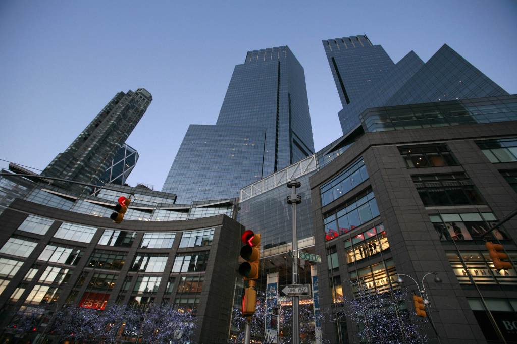 This Feb. 1, 2010, file photo, shows the Time Warner Center, in New York. The media conglomerate reports earnings Wednesday.
