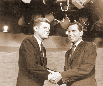 BEFORE THE DEBATE: John Kennedy, left, and Richard Nixon shake hands before their first televised debate.