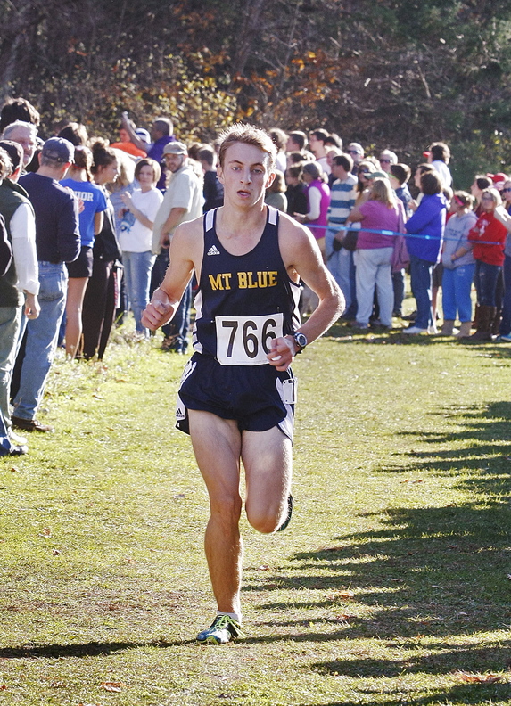 OUT FRONT: Mt. Blue High School’s Josh Horne runs alone during the Class A boys cross country state championship meet Saturday at Twin Brooks Recreation Area in Cumberland.