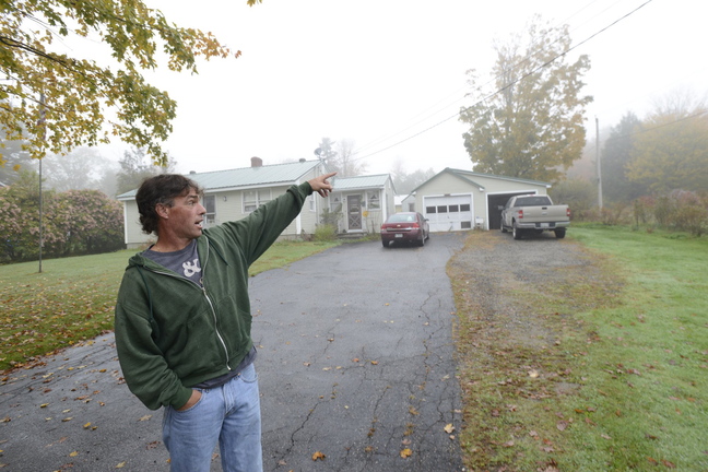 Ron Lafebvre, grandson of the property owner, points to where a fatal shooting took place at Brown’s Bee Farm in North Yarmouth.