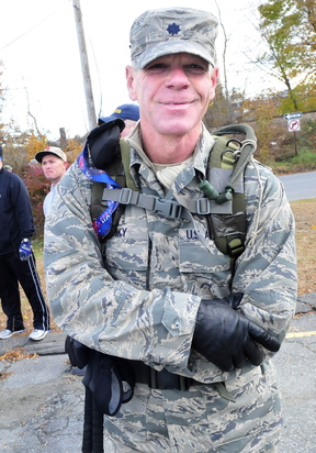 Maine Air National Guardsman Chip Ridky of Rome just completed the 10-mile Veterans Day march that ended in Waterville on Monday, Nov. 11, 2013.