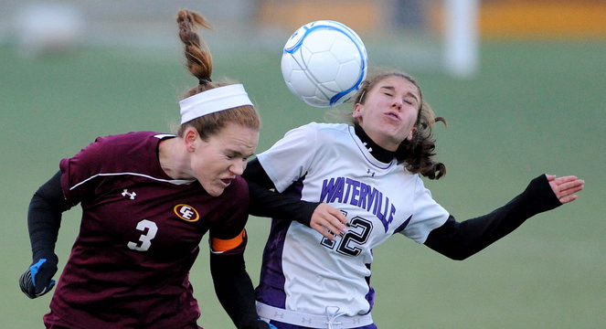 HEADS UP: Waterville Senior High School’s Lydia Roy, right, battles for the ball with Cape Elizabeth’s Elizabeth Raftice in the first half in the Class B State championship game at Hampden Academy on Saturday. Cape Elizabeth defeated Waterville in a shoot-out.