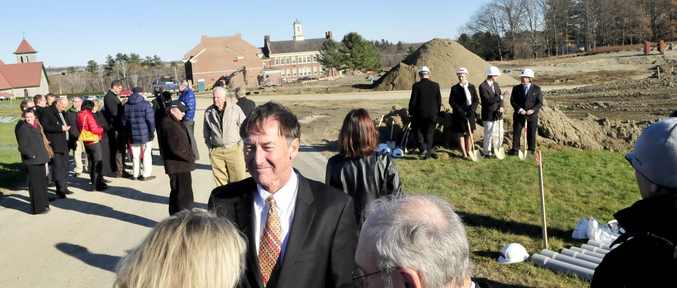 GROUNDBREAKING: Gregory Powell, president of the Harold Alfond Foundation, speaks with attendees at a groundbreaking ceremony for a new building at Kennebec Valley Community College in Hinckley on Wednesday. The building will house classrooms and labs on the school’s Harold Alfond Campus.